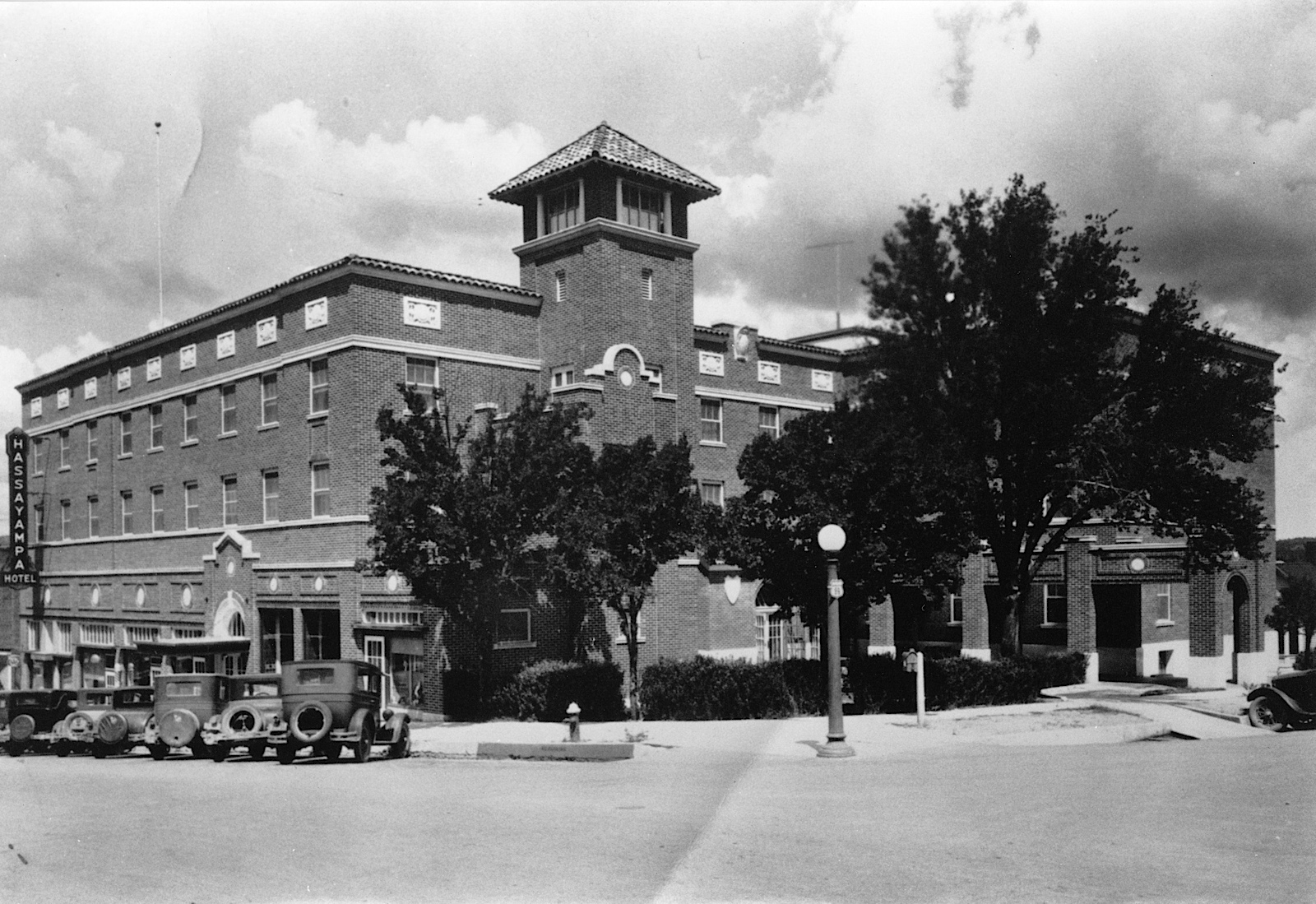 a large brick building with a tower