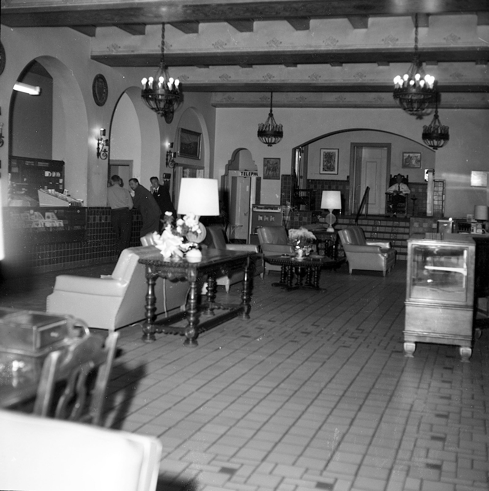 a room with a large table and chairs