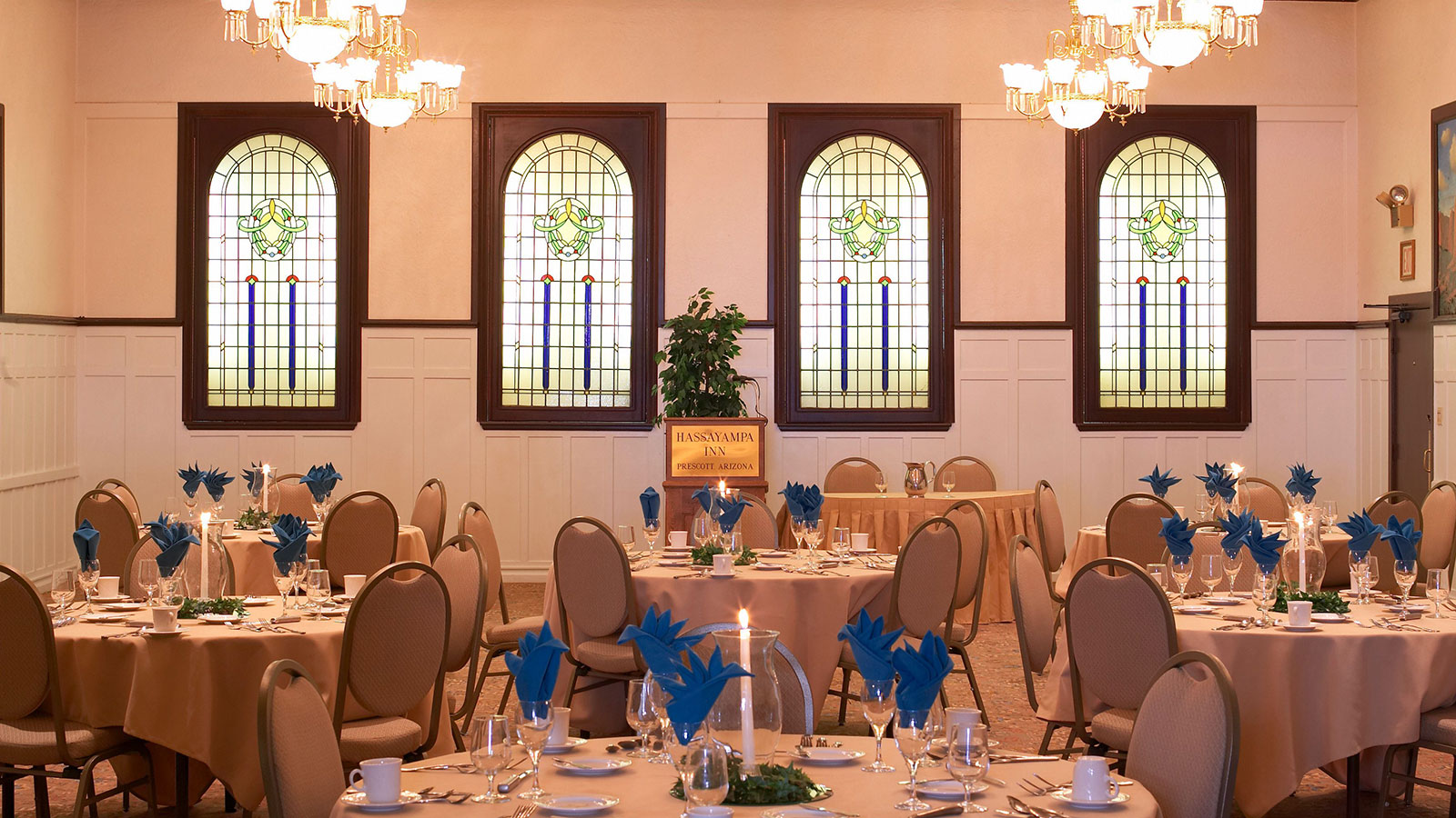 a room with tables and chairs