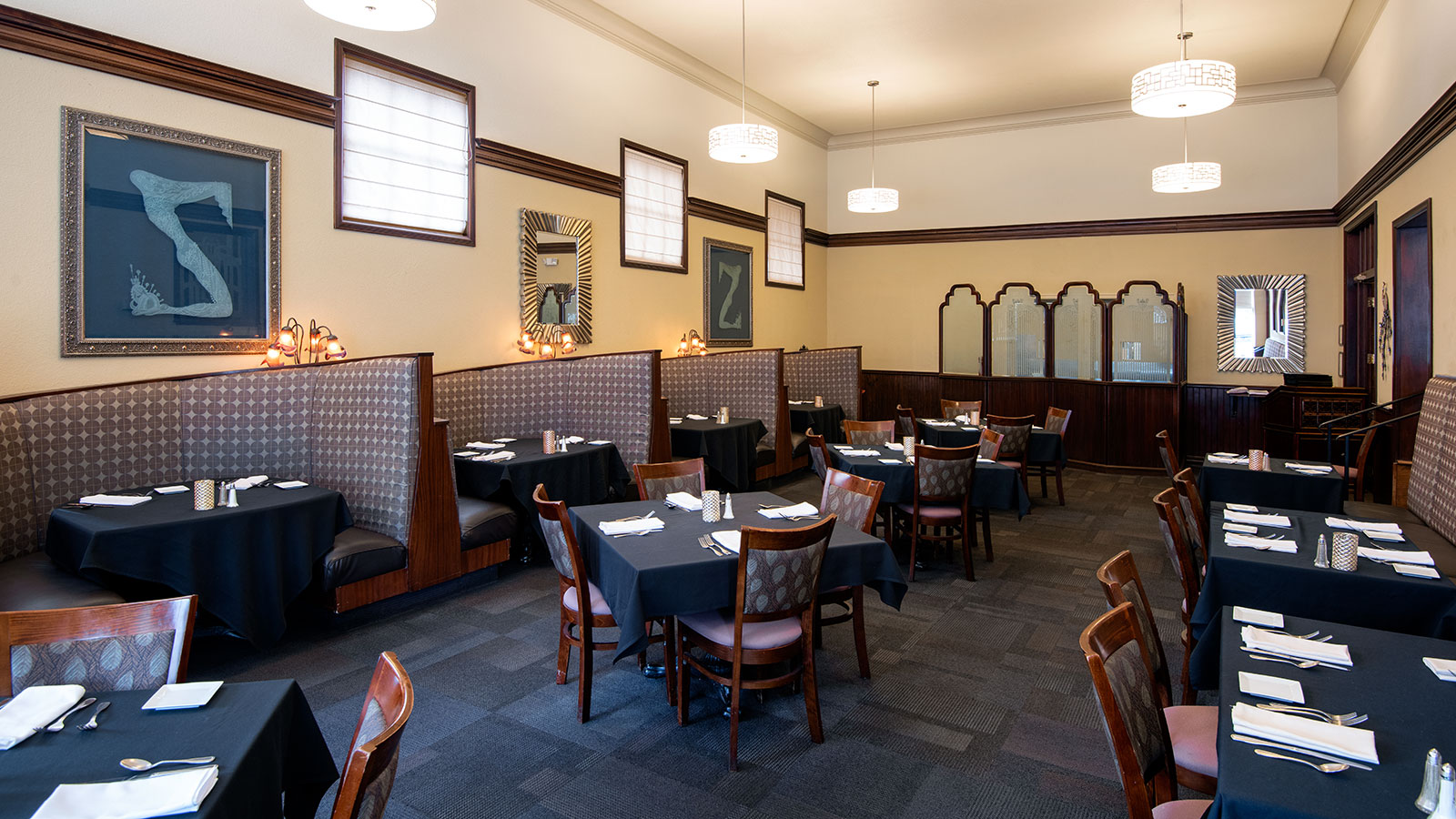 a restaurant with tables and chairs