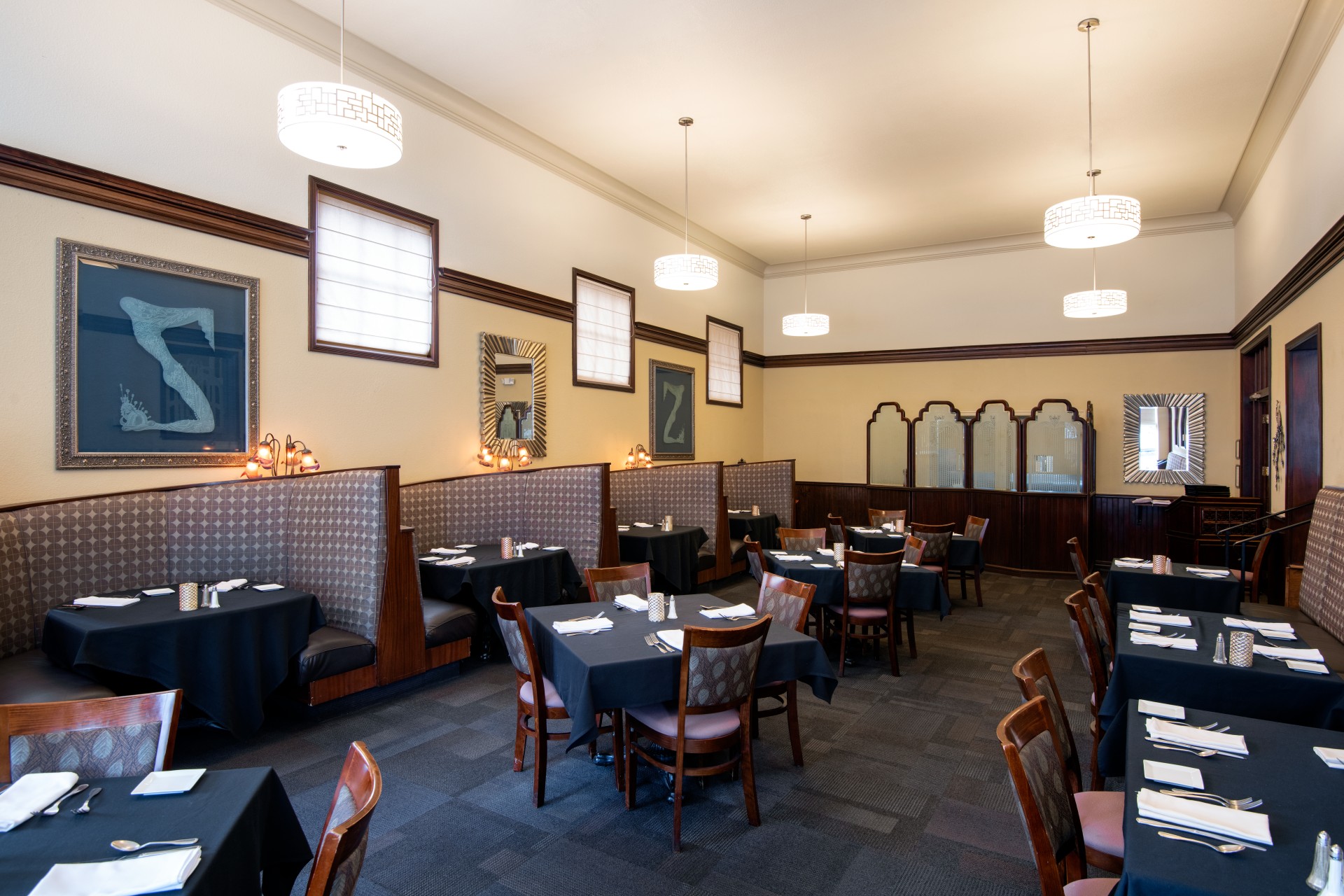 a restaurant with tables and chairs