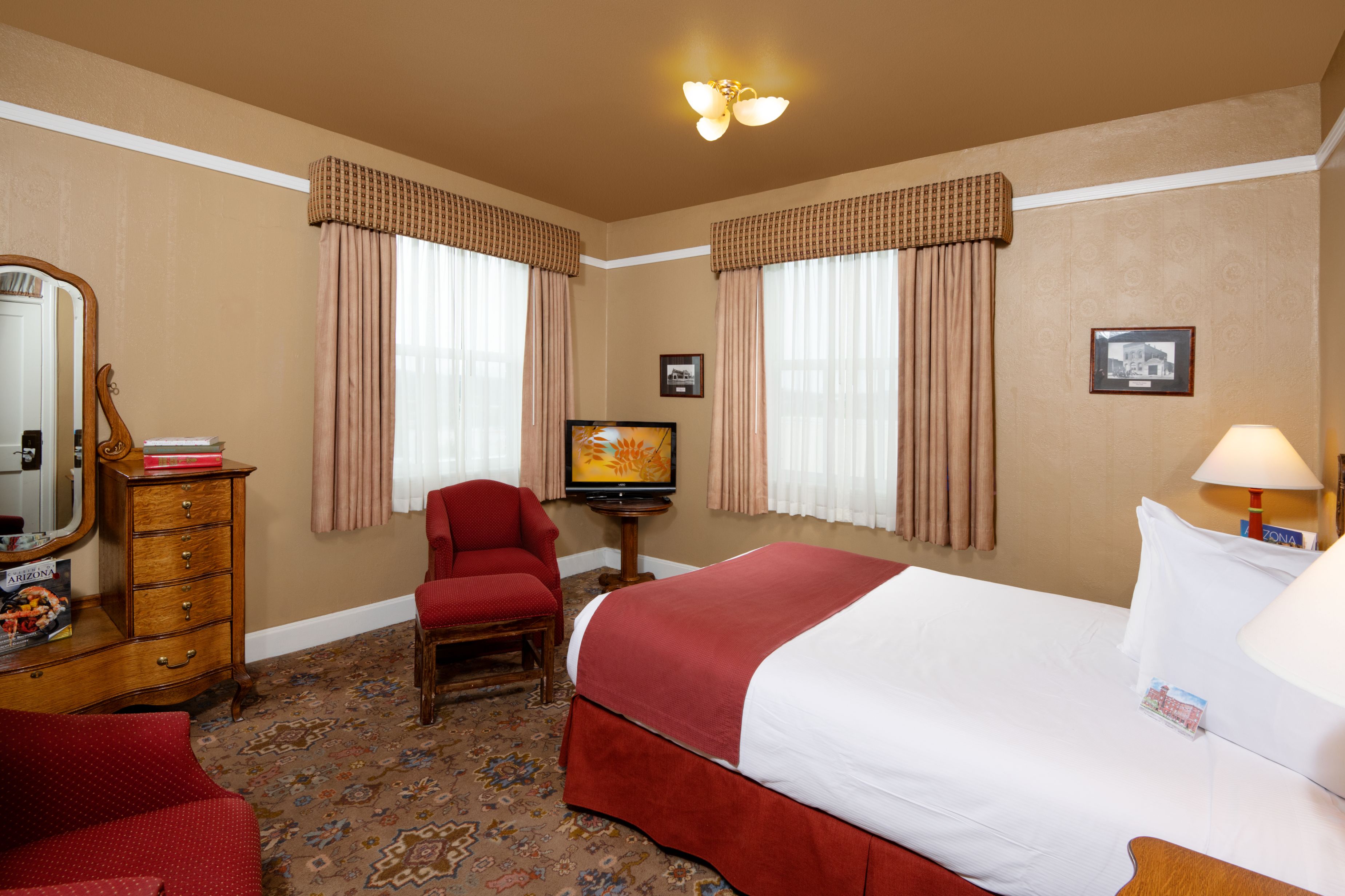 a room with a bed and a chair