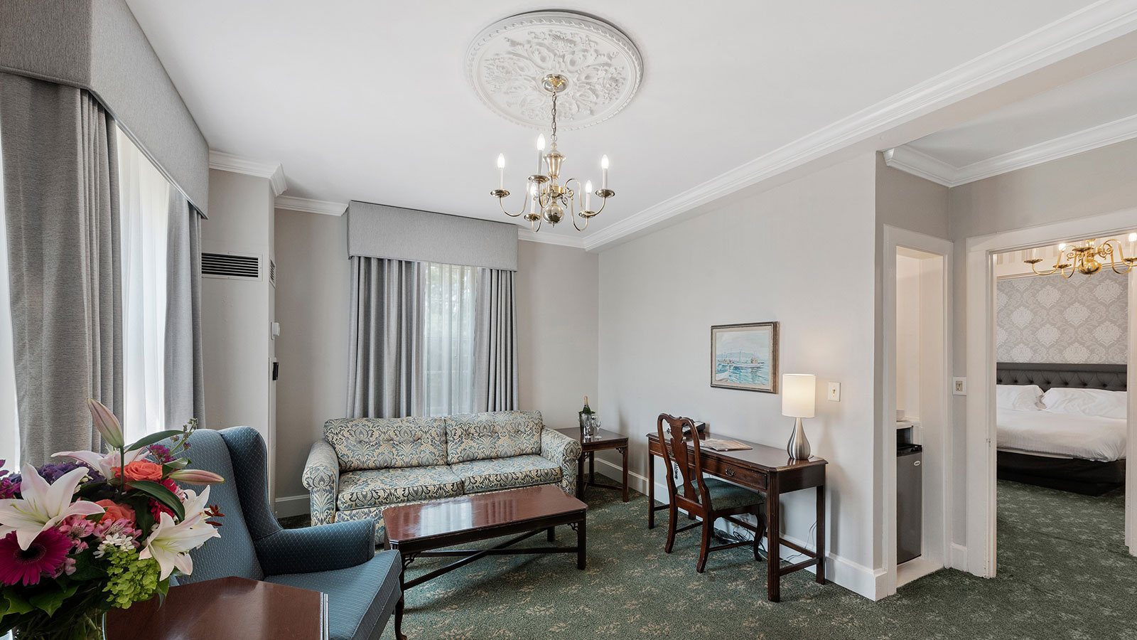 a room with a couch and a desk