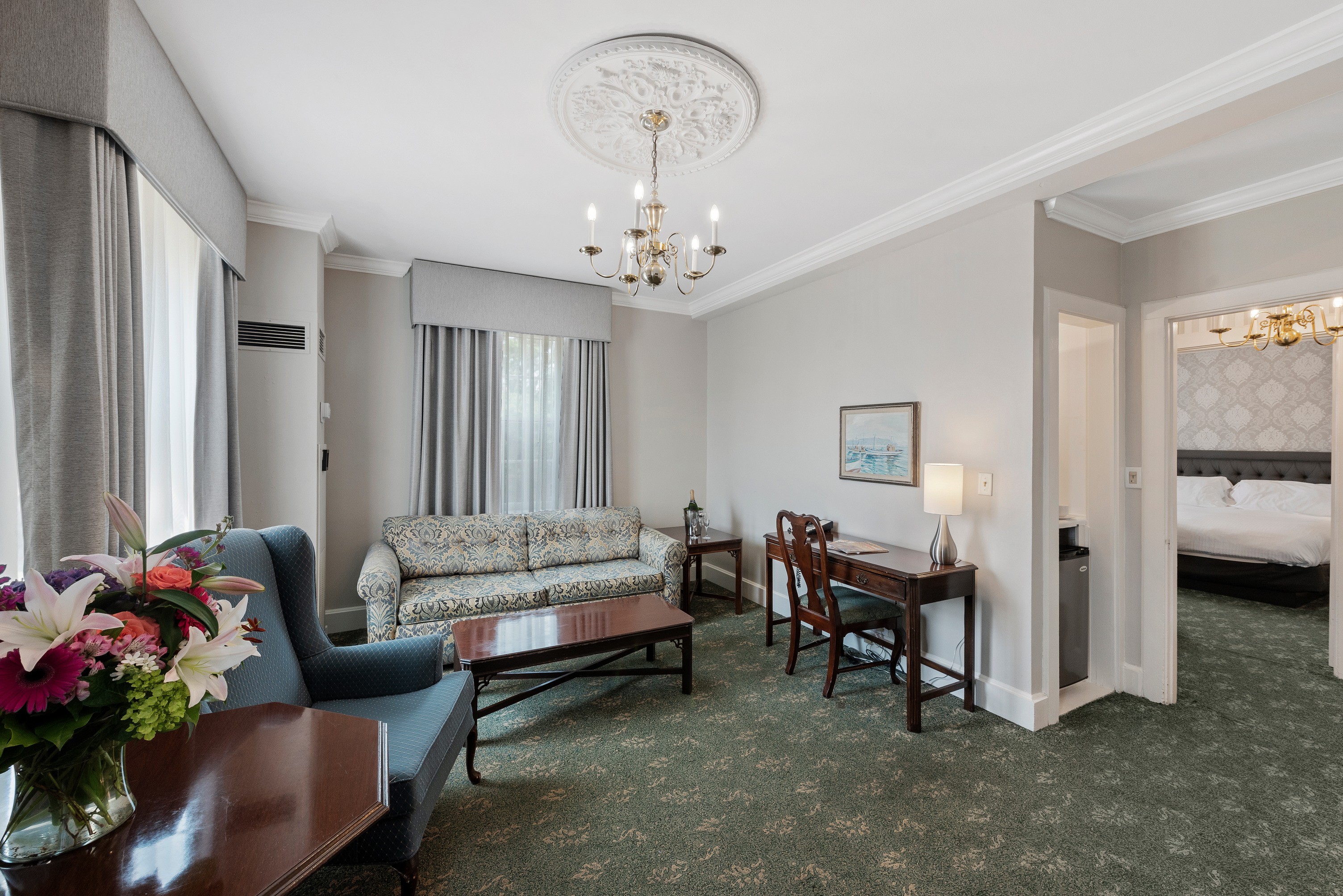 a room with a couch and a desk
