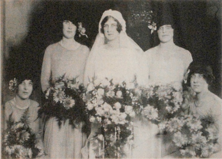 a group of women posing for a photo