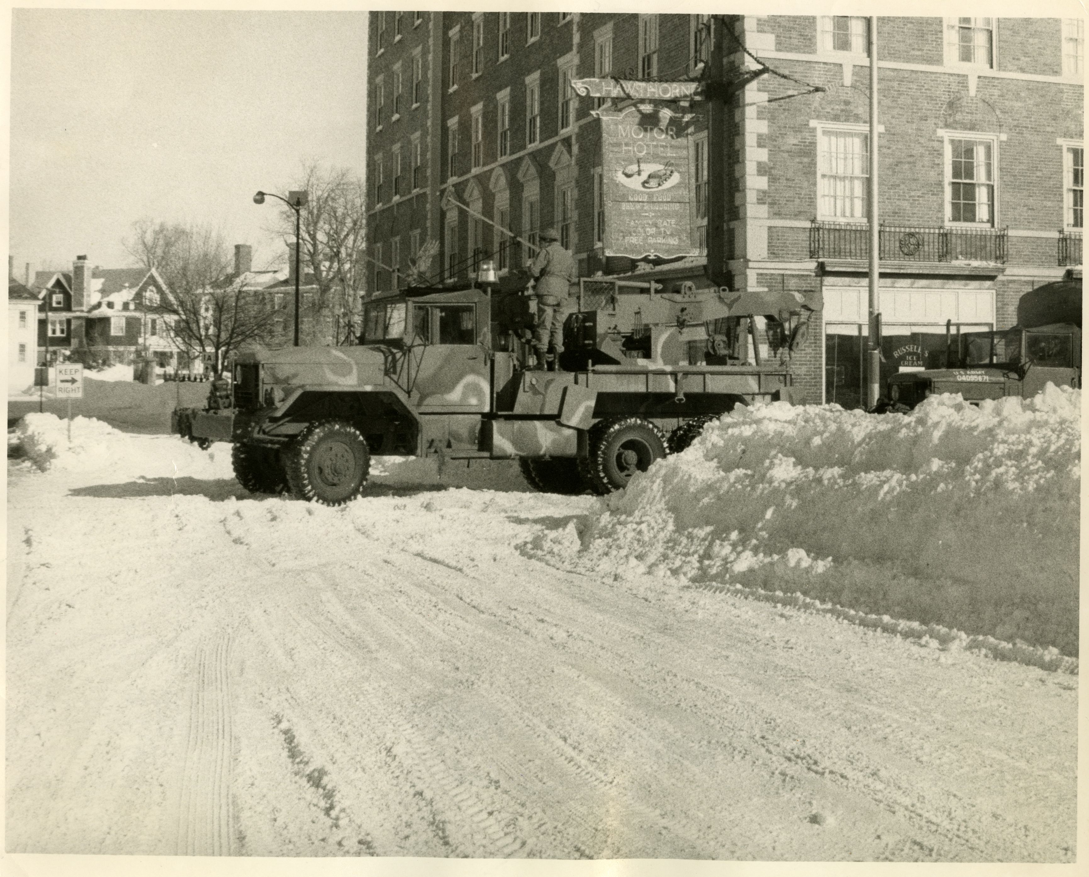 a military truck parked in the snow