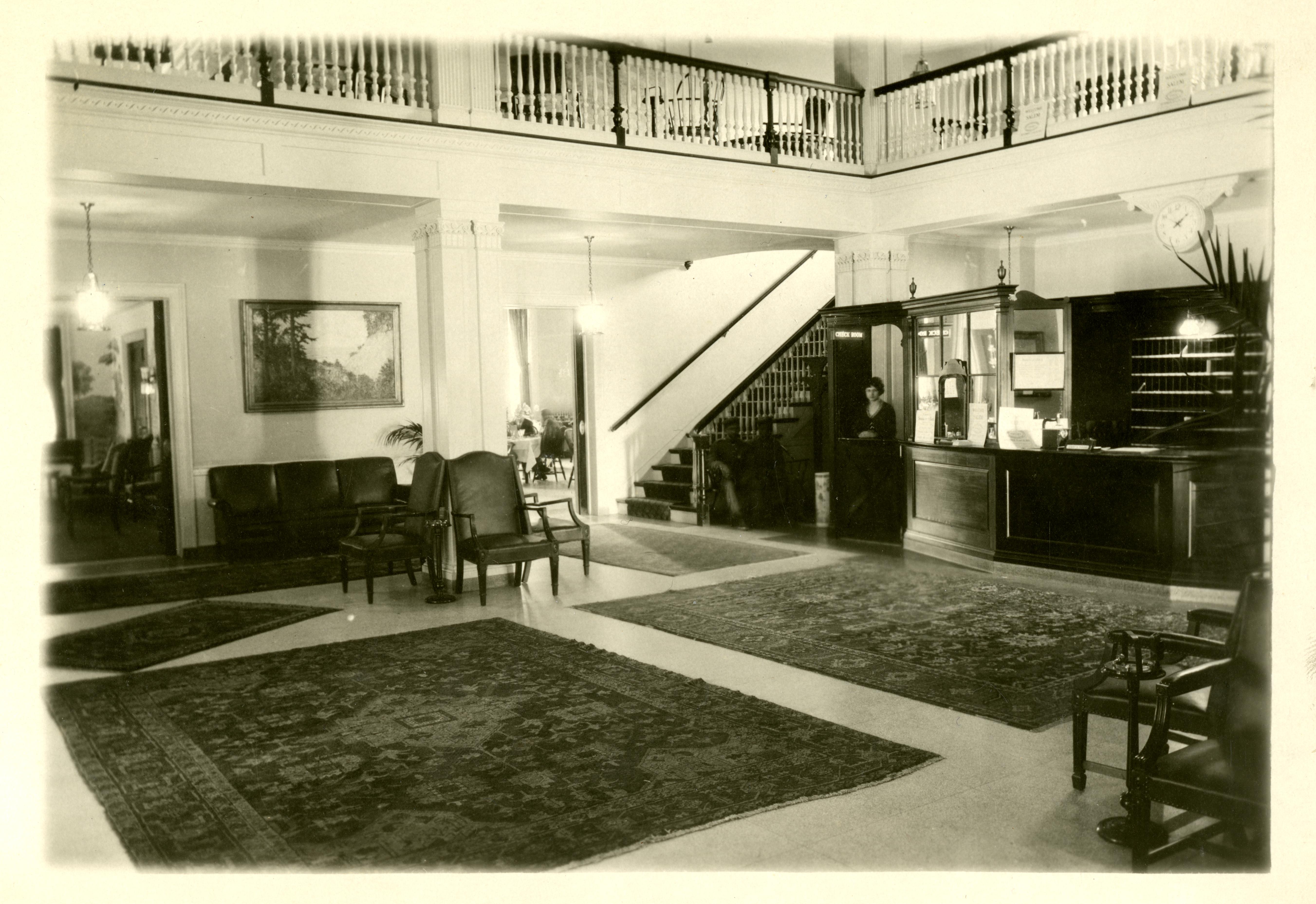 a black and white photo of a living room