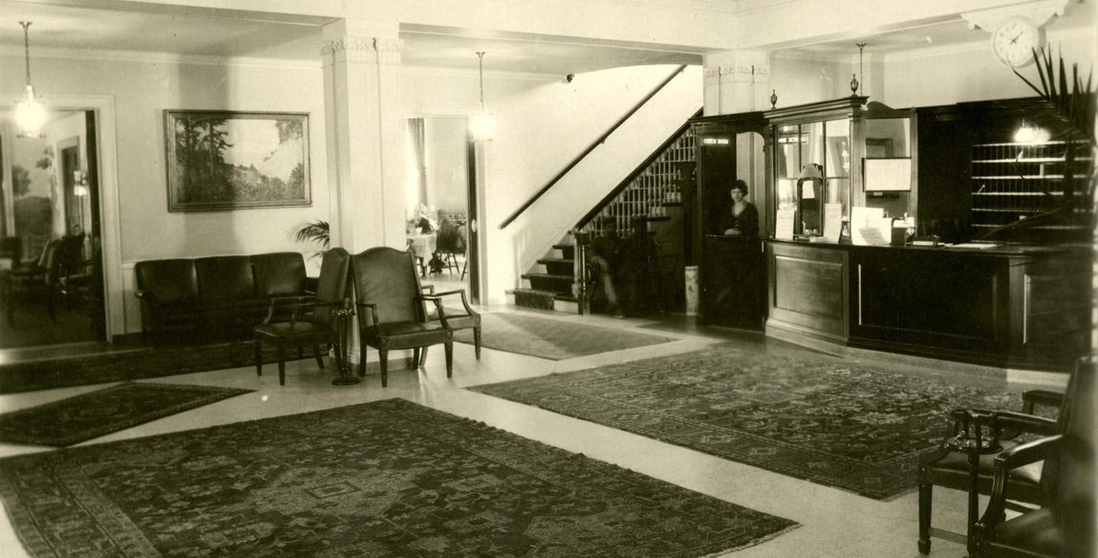 a black and white photo of a lobby