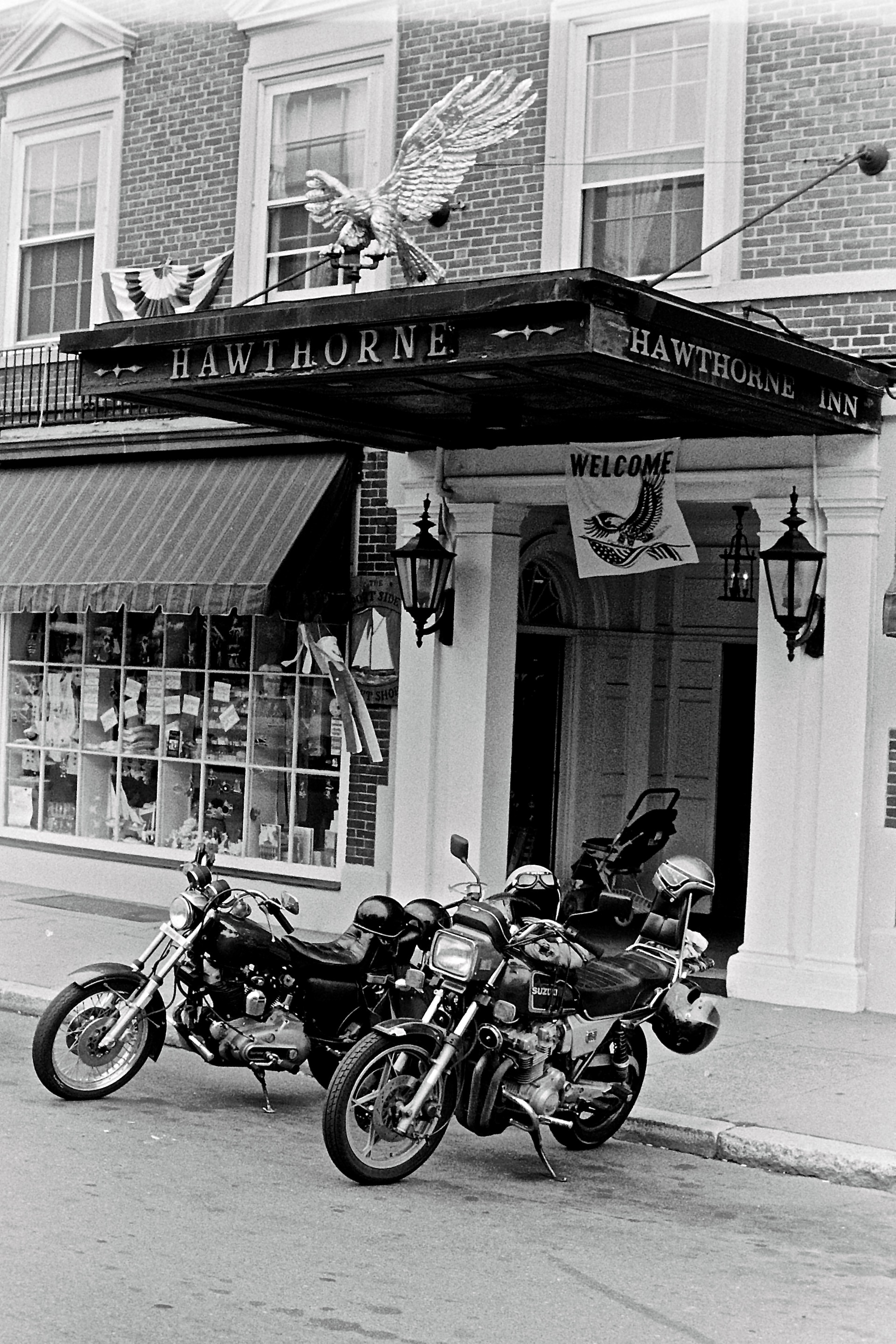 motorcycles parked in front of a building
