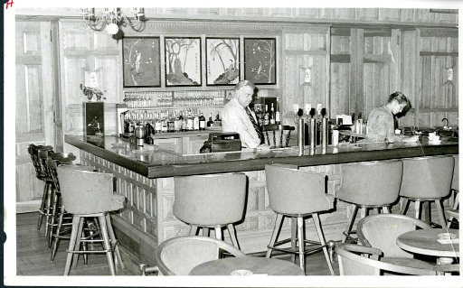 a man behind a bar