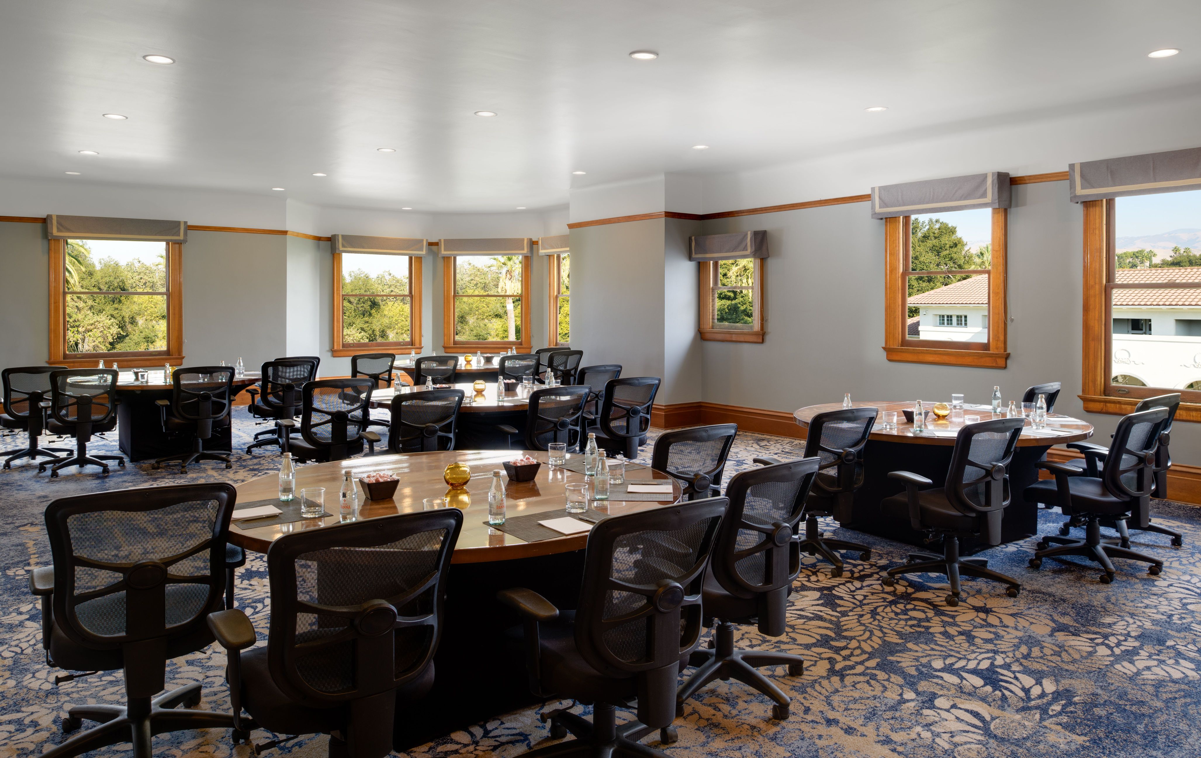 a room with tables and chairs