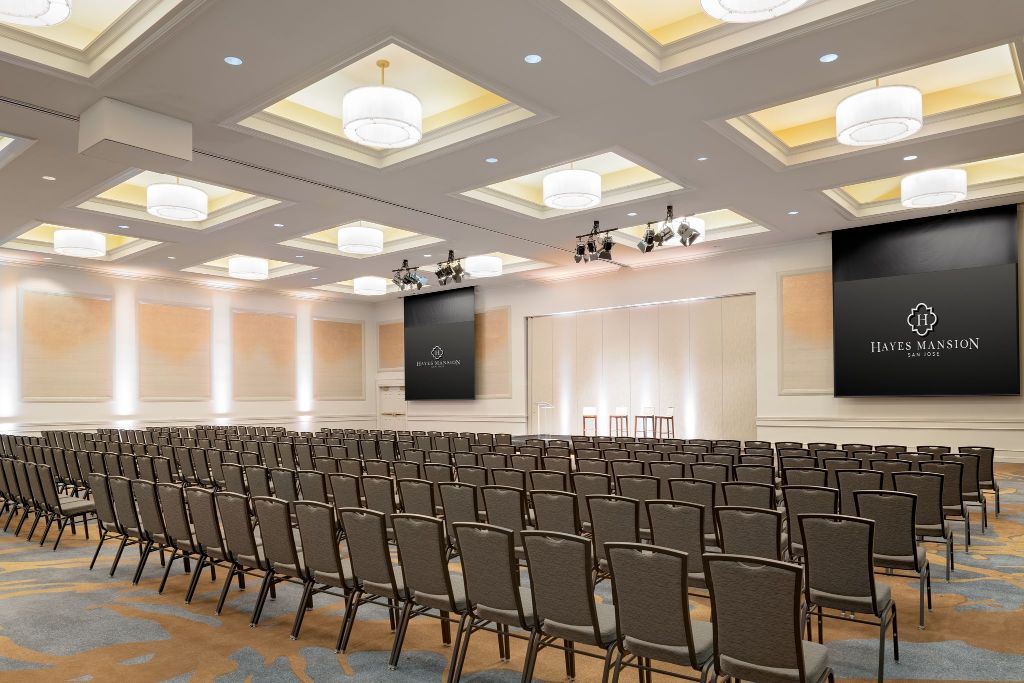 a room with rows of chairs