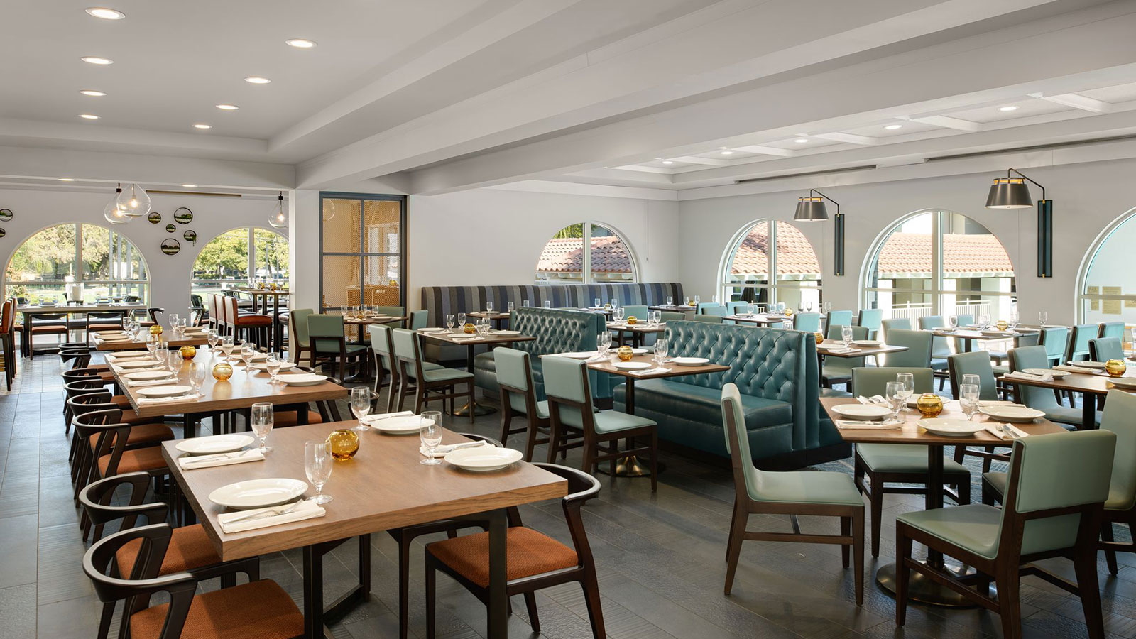 a restaurant with tables and chairs