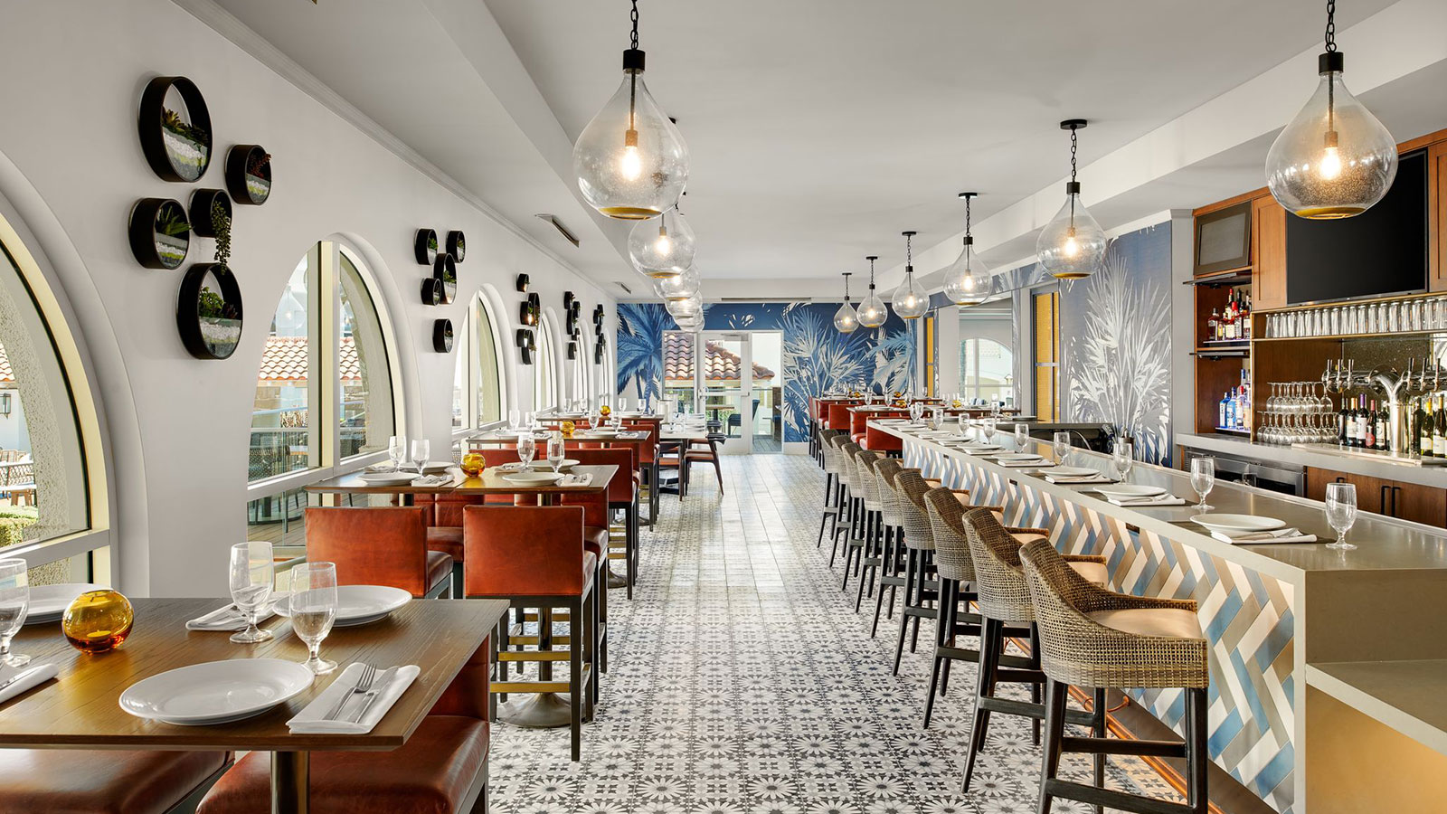 a restaurant with tables and chairs