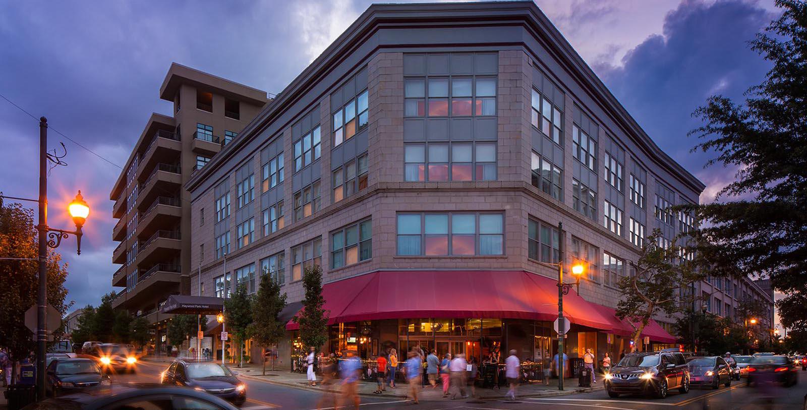 a building with people walking on the street