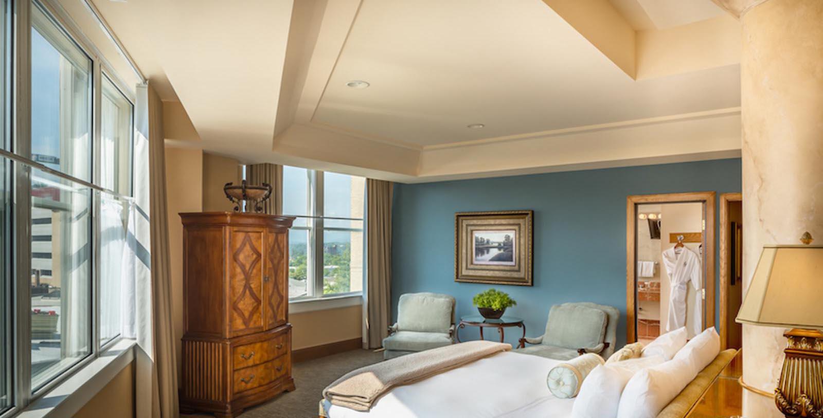 a room with a bed and a cabinet