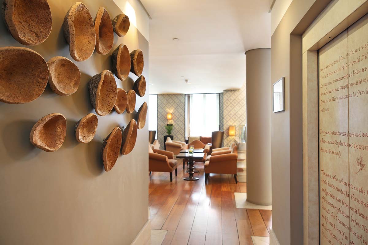 a room with a wall with a group of objects on the wall