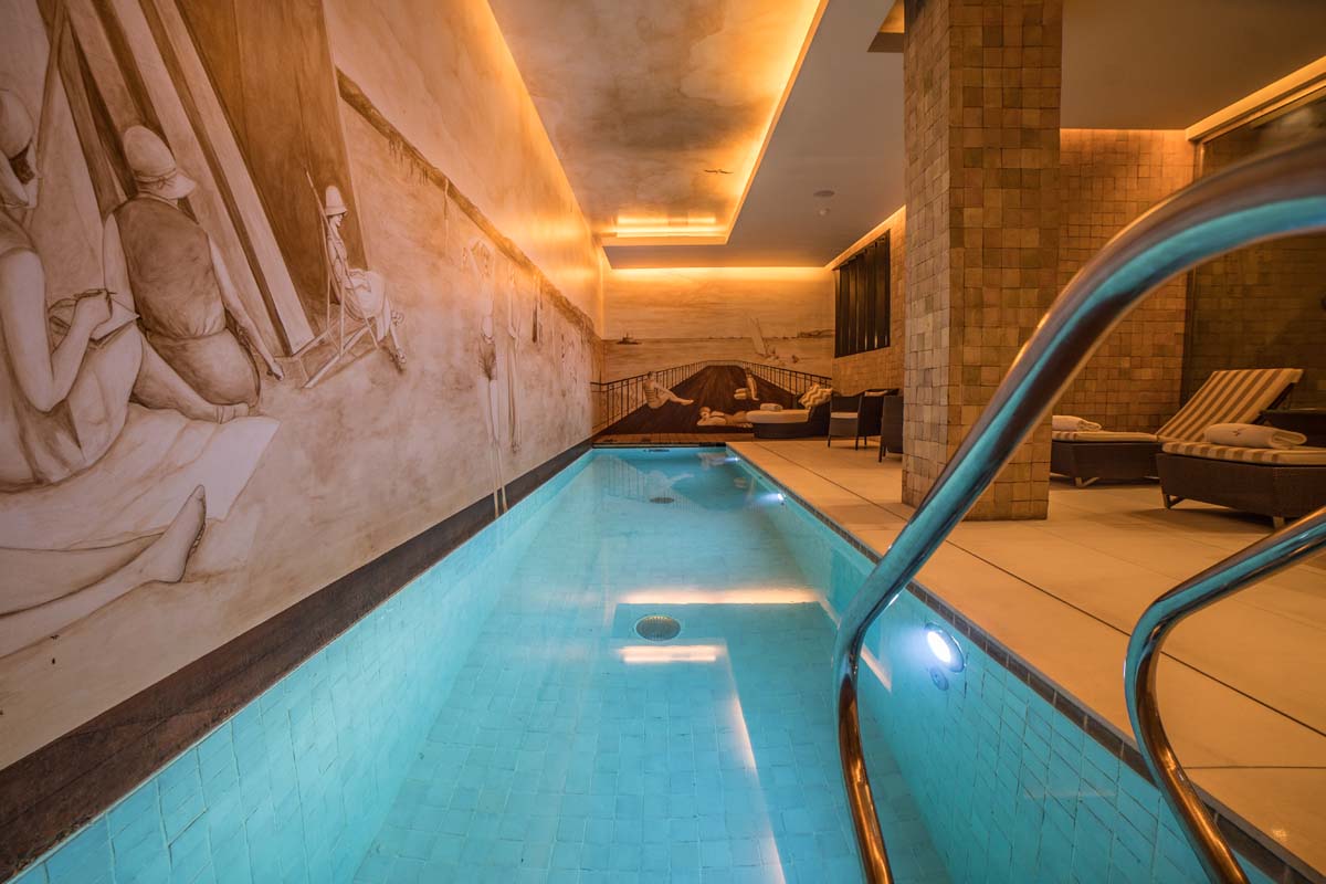 a swimming pool inside a building