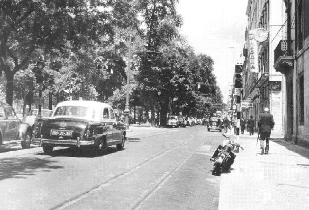 a black and white photo of a street