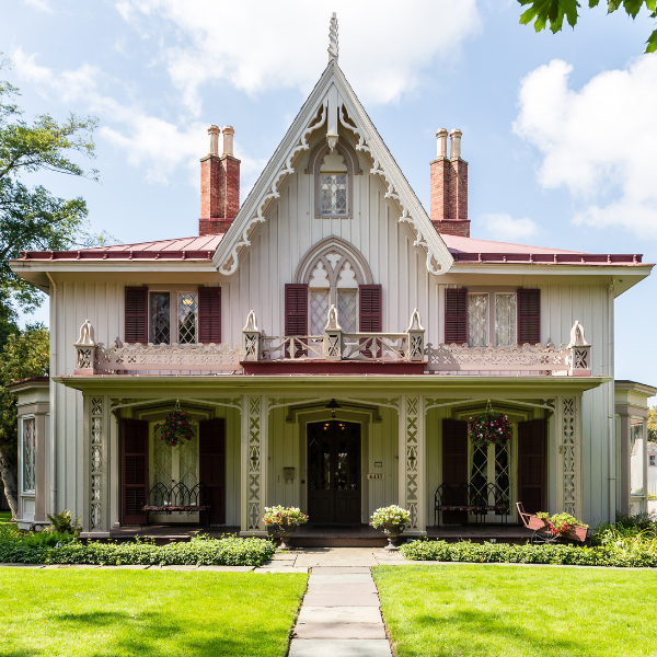 a house with a lawn and a walkway