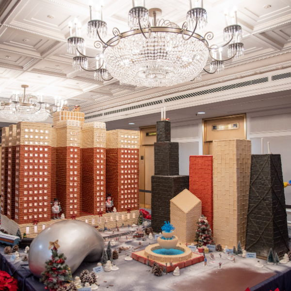 a large model of buildings and a chandelier