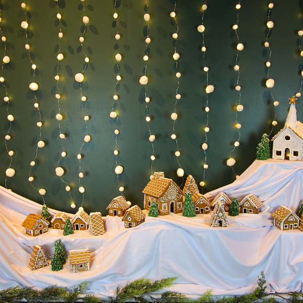 a display of gingerbread houses and trees