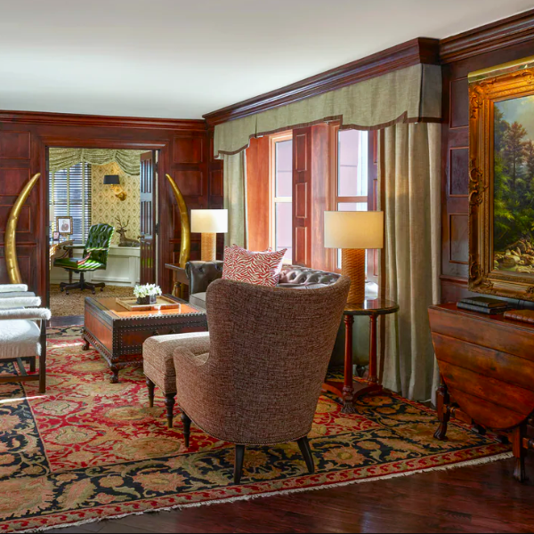 a room with a painting on the wall