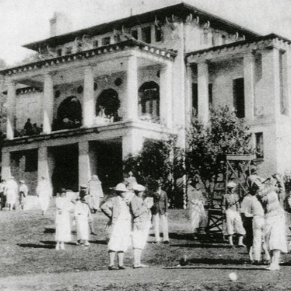 a group of people standing outside a building