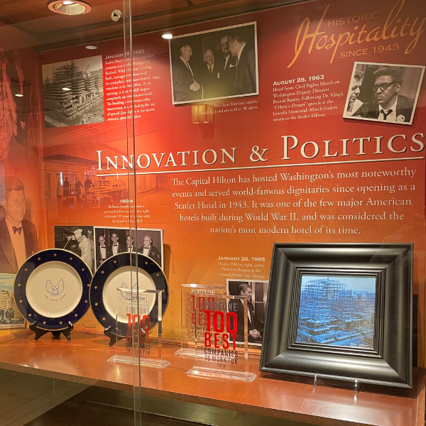 a display of plates and picture frames