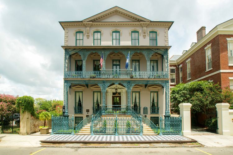 a building with a blue railing