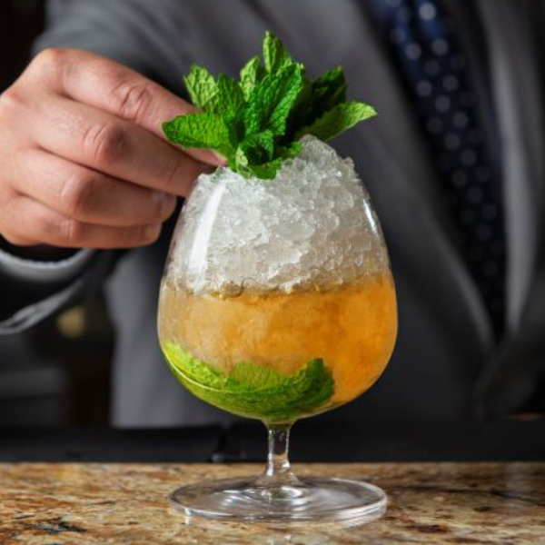 a person holding a drink