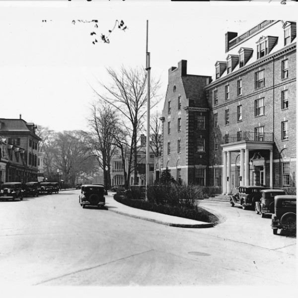 a street with cars and buildings