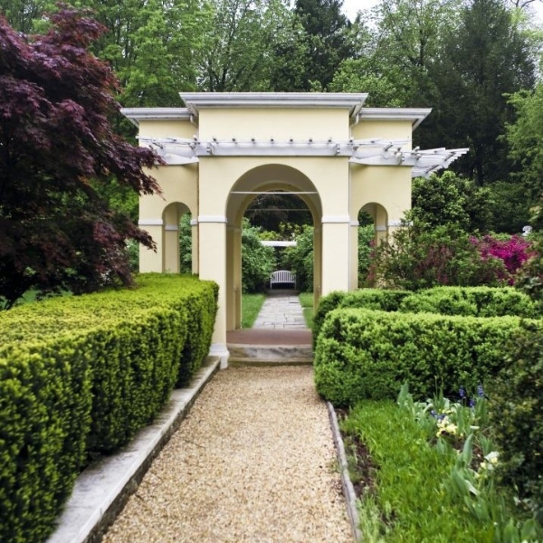 a path leading to a garden