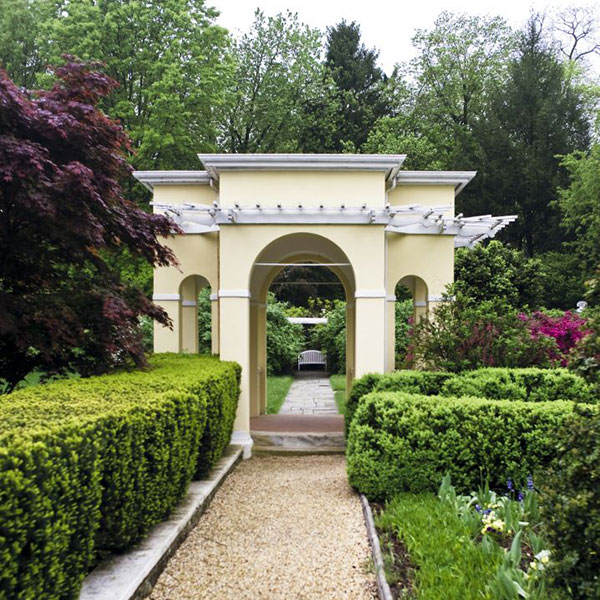 a path leading to a garden