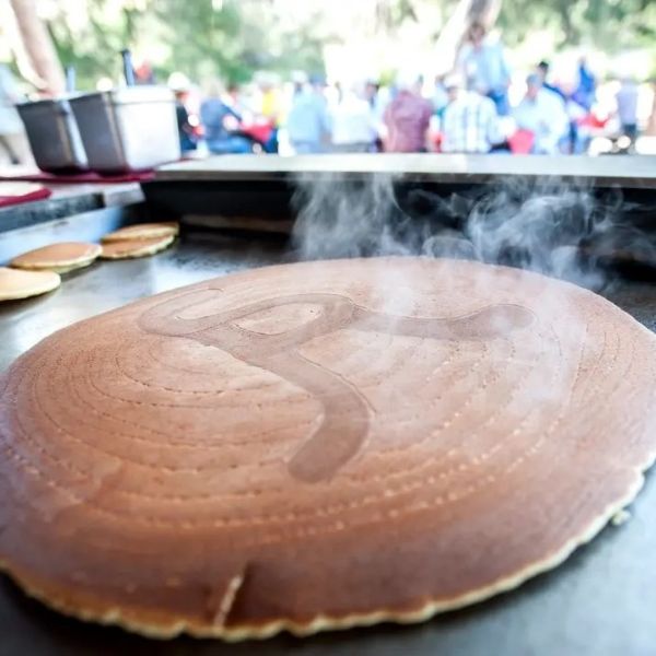 a pancake with smoke coming out of it