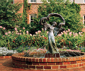 a fountain in a garden