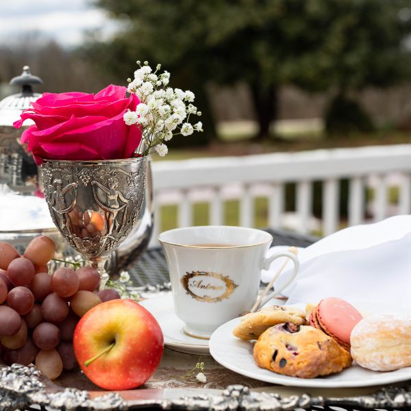 a tray with food and a cup of tea on it