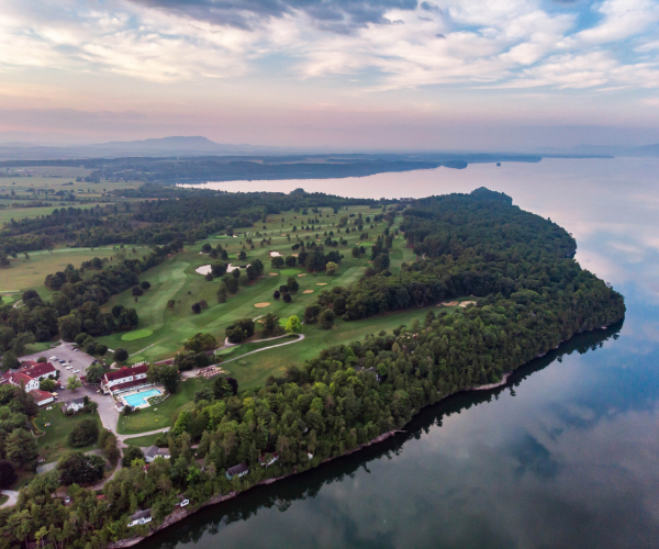 an island with a golf course and a pool on it