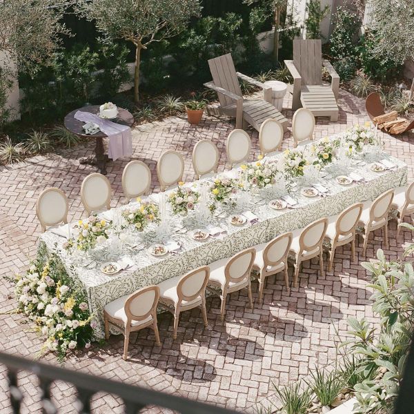 a long table set for a dinner party