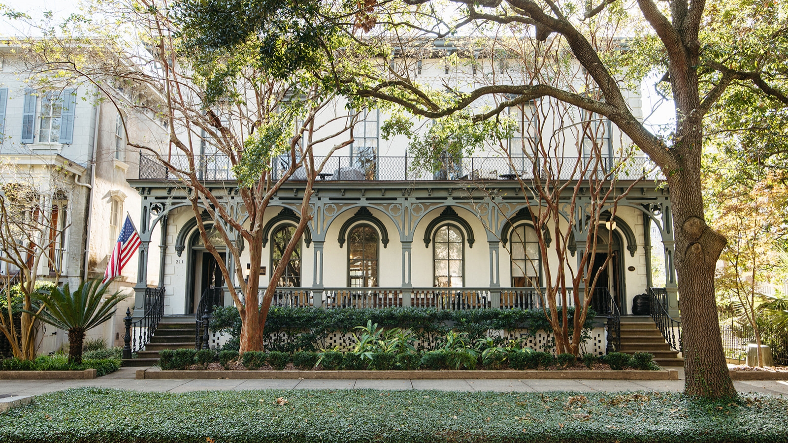 a building with trees in front of it 16