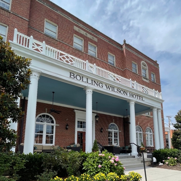 a building with columns and a sign