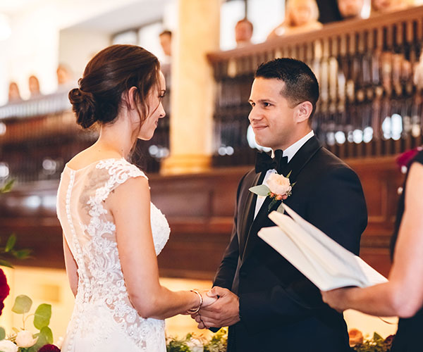 a man and woman holding hands
