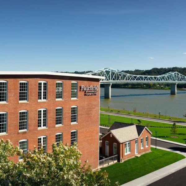 a building with a bridge over the water