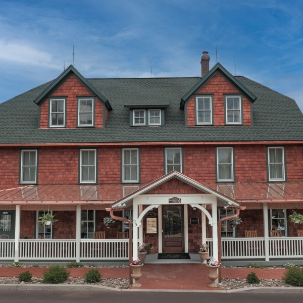 a large house with a white porch