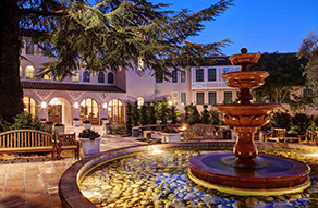 a fountain in front of a building