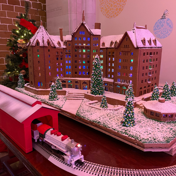 a model of a town with a train on a table