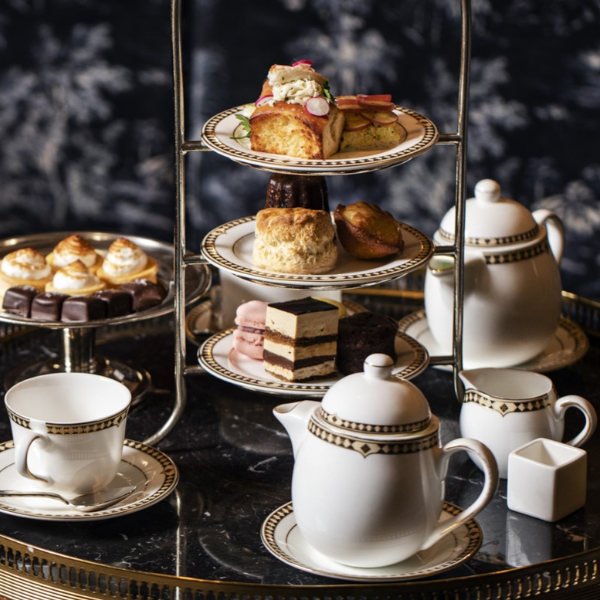 a tray of tea with food on it
