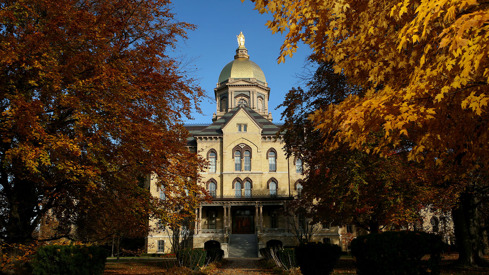 University of Notre Dame with a gold dome and a gold dome on top