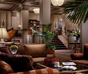 a room with a large staircase and a couch