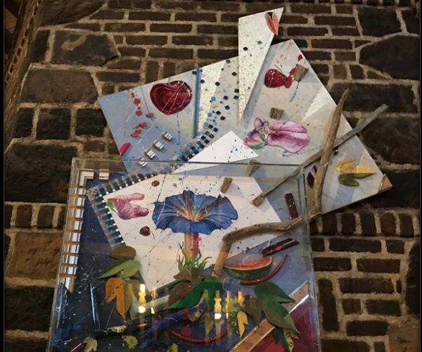 art pieces of art on a brick surface